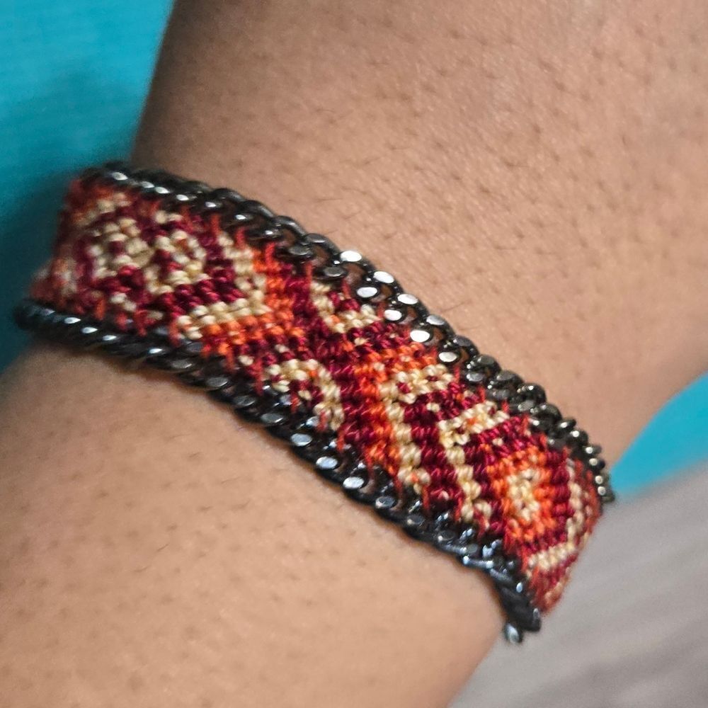 Unisex Pony express woven bracelet with chain lining.